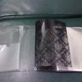 珠友封面拆解：一透明膠套、一黑色鏤空封皮、一銀色霧面紙