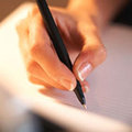 A writing hand