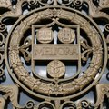Emblem on the entrance door of Rush Rhee Library (U of Rochester)