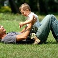 Dad playing with child