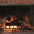 2010 感恩節大餐 - eating in front of fireplace