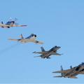 美國三代戰機聚一堂：P-51，F-86，F-16，和F-15。