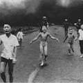 8 June 1972: Kim Phuc, center left, running down a road near Trang Bang after a VNAF napalm attack.<br>(@Nick Ut/Associated Press)<br>The VNAF (abbreviation for Viet Nam Air Force)