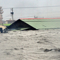 Flood waters brought by Typhoon Morakot submerge a house in Chiatung, Pingtung county, in southern Taiwan, on August 9, 2009. (SAM YEH/AFP/Getty Images)