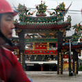 15Rescuers are seen before a Taoist temple inundated in floodwaters brought by Typhoon Morakot in Chiatung, southern Taiwan, on August 9, 2009. (SAM YEH/AFP/Getty Images)