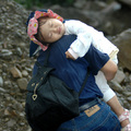 A girl is carried out from mudslide caused by Typhoon Morakot in Chiashien, Kaohsiung county, in southern Taiwan, on August 10, 2009. (PATRICK LIN/AFP/Getty Images)