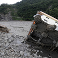 A collapsed apartment block lies on a river bed in Taimali, in southeast Taiwan's Taitung county on August 10, 2009. (AFP/AFP/Getty Images)