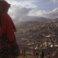 A young girl looks over the masses of tents set up in a Kurdish refugee camp in Iraq following Operation Desert Storm. 12 May 1991. © Pascal Le Segretain/Sygma/Corbis
 
