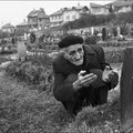 Father kneeling at his son's grave - Sarajevo, Bosnia and Herzegovina. 2 December 1995. © David Turnley
 
