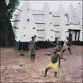 Here, children dance in front of Larabanga's mosque in Ghana after the rains stopped in this picture shot by Arwen Kidd.