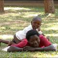 Leonie Exel sent in this picture of a toddler, who is being treated in the paediatric ward at Uganda's Kiwoko Hospital, having a play on the lawn with his mother.