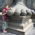 Holding the foot of the statue of Tiruvalluvar
http://en.wikipedia.org/wiki/Statue_of_Thiruvalluvar