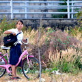 Girl with bicycle