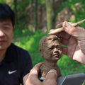 鬼斧神工的人像即席雕塑, 青島 中國