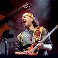 plays his signature model, Paul Reed Smith (PRS) Santana II, in concert.