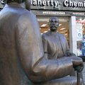 This is a bronze statue in Shop St, which shows a meeting of Irish writer Oscar Wilde and Estonian writer Eduard Wilde (although they never met in real life).(http://www.frommers.com/destinations/galway/0134010001.html)