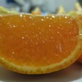 媽媽給的橘子, 那天下午她要回彰化看住在加護病房的阿公. 這個橘子的橙色和木棉花的橙串在一起, 成為我對阿公的記憶索引.