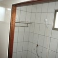 女生宿舍: 增設浴室 ，包含 蓮蓬頭 和置衣架 在內。金崙 電器行蔡 水藤老闆 施作。