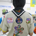 童軍襯衫背後~貼繡著可愛花&樹之社區生態人文關懷。
