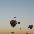 Sunrise with the balloons taking off