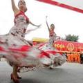 Dancers perform during a ceremony of the inaguration of a train that will work with natural gas at a train station in Lima June 16, 2005.REUTERS/Pilar Olivares Email Photo Print Photo