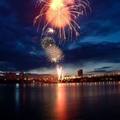 Fireworks sparkle above the Yenisei river in the centre of the Siberian city of Krasnoyarsk June 4, 2005. Krasnoyarsk citizens on Saturday marked their City's Day with carnival and fireworks. REUTERS/Ilya Naymushin