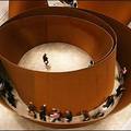 At the Guggenheim : People walk through giant works of US sculptor Richard Serra at the new Guggenheim Bilbao Museum exhibition 'The Matter of Time.' (AFP/Rafa Rivas)