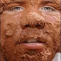 After the pit : Jamie Peele leaves the mud pit at the 10th annual 'Redneck Games' at Buckeye Park in East Dublin, Georgia. (AFP/Jeff Haynes)