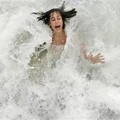 in front of the Barceloneta beach in Barcelona, Spain, Monday, July 18, 2005. With temperatures rising summers on record since record-keeping began 60 years ago. (AP Photo/Manu Fernandez)