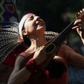 Dionisia Garcia sings during a celebration for Santiago Peregrino (Santiago the Pilgrim) in New York City on July 24, 2005.  REUTERS/Seth Wenig