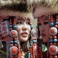 Mongolian models : Chinese Mongolian models parade the latest in traditional fashion, designed by a Mongolian designer, during the Naadam festival on the grassland of Gegental Steppe in China's Inner Mongolia region. (AFP/Goh Chai Hin)