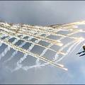 Flying for show : A pilot of a Russian military air force demonstration team performs with his SU 27 jet fighter, during the WWII-time air show in the town of Monino, some 40 kms from Moscow. (AFP/Mladen Antonov)