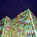 Swiss illumination artist Gerry Hofstetter projects flowers onto the Marriott Hotel in Berlin, Tuesday, Aug. 2, 2005. (AP Photo/Franka Bruns)