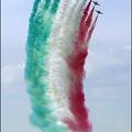 Italian aerobatics team fly in formation during their performance above the tarmac of the Hungarian air force base in Kecskemet during an international air show and military display. (AFP/Attila Kisbenedek)