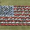 This photo provided by Jeep shows 140 vehicles positioned by Jeep owners in the form of an American flag Thursday, Aug. 11, 2005(AP Photo/Jeep, Stuart Ramson)