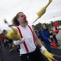 Jugglers perform at the beginning march of the European Jugglers Convention in Ptuj, Slovenia August 15, 2005. About 3,000 jugglers gathered on the 28th European Jugglers Convention. REUTERS/Srdjan Zivulovic