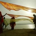 Women dry saris on the banks of the River Ganges in Allahabad, India, Thursday, Aug. 25, 2005. Allahabad is one of Hinduism holiest sites. (AP Photo/Rajesh Kumar Singh)