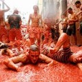  The biggest tomato fight of the world takes place when the town erupts in a fiery blaze of tomato hurling on the last Wednesday of every August. (Albert Gea/Reuters)