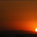 A boy dives from a pier into the Mediterranean Sea as the sun sets over the Turkish riviera in Konakli summer resort near the city of Alanya. (AFP/Joe Klamar)