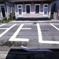 A huge 'Help' sign is painted on an empty street in New Orleans, Louisiana, eight days after the hurricane ripped through the city. (AFP/Hector Mata)