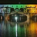 The famous Ponte Vecchio bridge is lit up in rainbow colors to commemorate the fourth anniversary of the Sept. 11 terrorist attacks, in Florence, Italy, Sunday, Sept. 11, 2005. (AP Photo/Lorenzo Galassi)