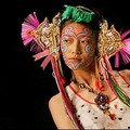 A model shows clothes by Indian designer Manish Arora at the Natural History Museum in London, on the first day of London Fashion Week. (AFP/John D McHugh)