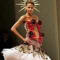 Model Noemie Lenoir presents a bustier,