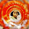  A young Bangladeshi girl looks at the bangles in a shop for the celebration of Eid festival in Dhaka. (AFP/Farjana K. Godhuly)