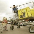 This photo supplied by Guinness World Records shows Edd China talking to a shopper while driving his way into Guinness World Records book in Henley-upon-Thames