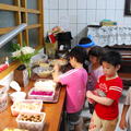 There were 1 big cake and 15 dishes of fruits and candy...It's all mother's affection for you all.