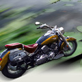 Motorcycle cruising on the lake, background motion blur & wheel spin radial blur (for Header)