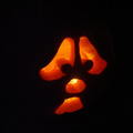 The carved pumpkin- Ghost Face with candle light