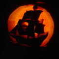 The carved pumpkin- Pirate Ship with candle light