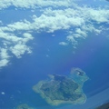因為颱風在附近或台北雨太大,飛機繞路結果看到琉球群島